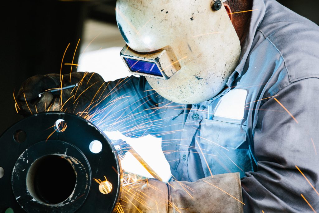 laborer working with sparks flying